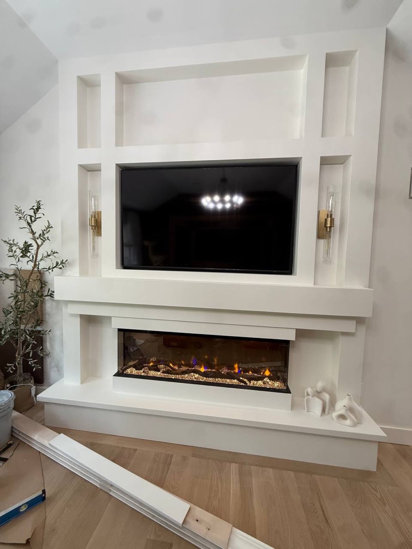 Custom fireplace media wall with built-in niches